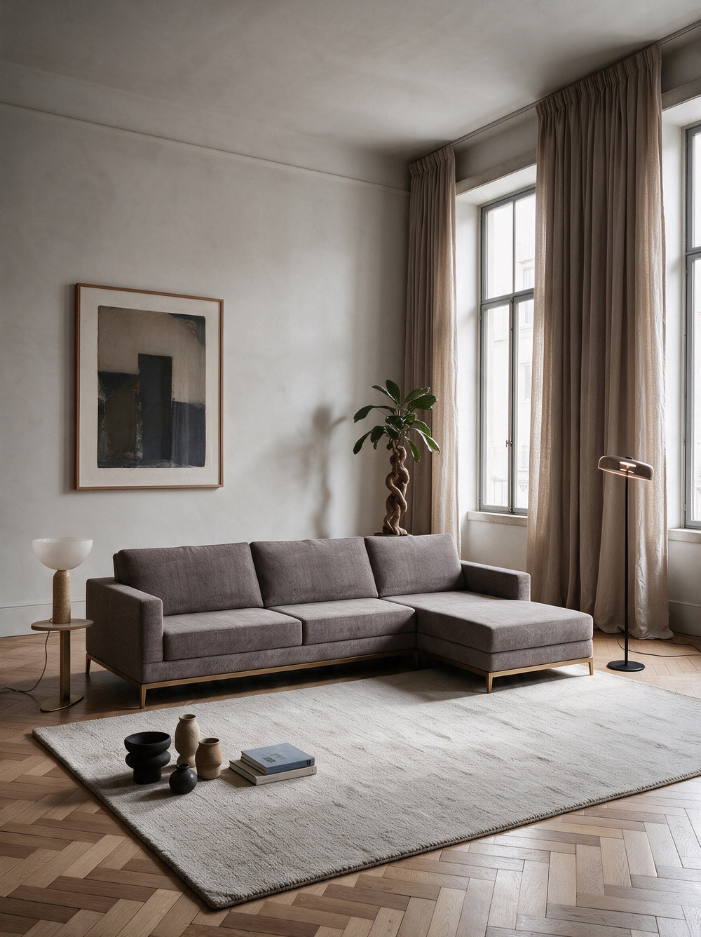 Sala com o OPPUS chaise e o PEDRA OPALA
